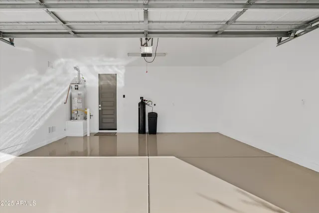 a view of backyard with patio