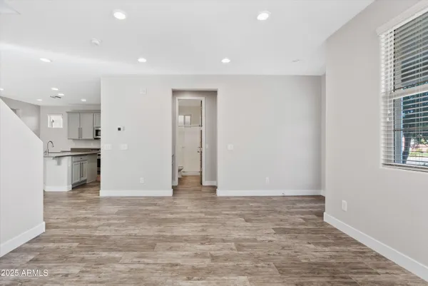 a view of kitchen with wooden floor