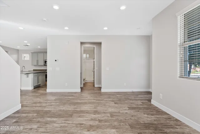 a view of kitchen with wooden floor