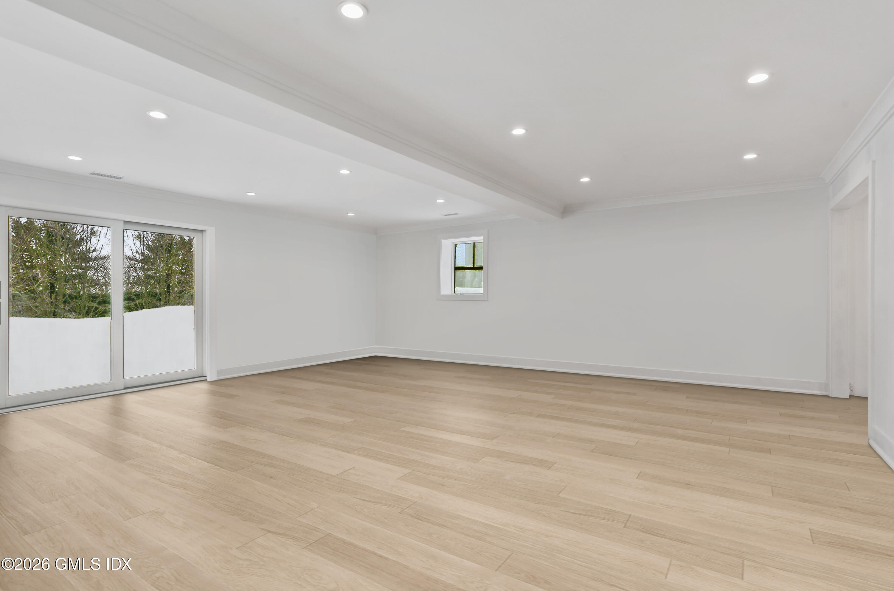 112 Sheep Hill Road Riverside, CT 06878 - Photo 25 of 30 a view of an empty room with wooden floor and a window