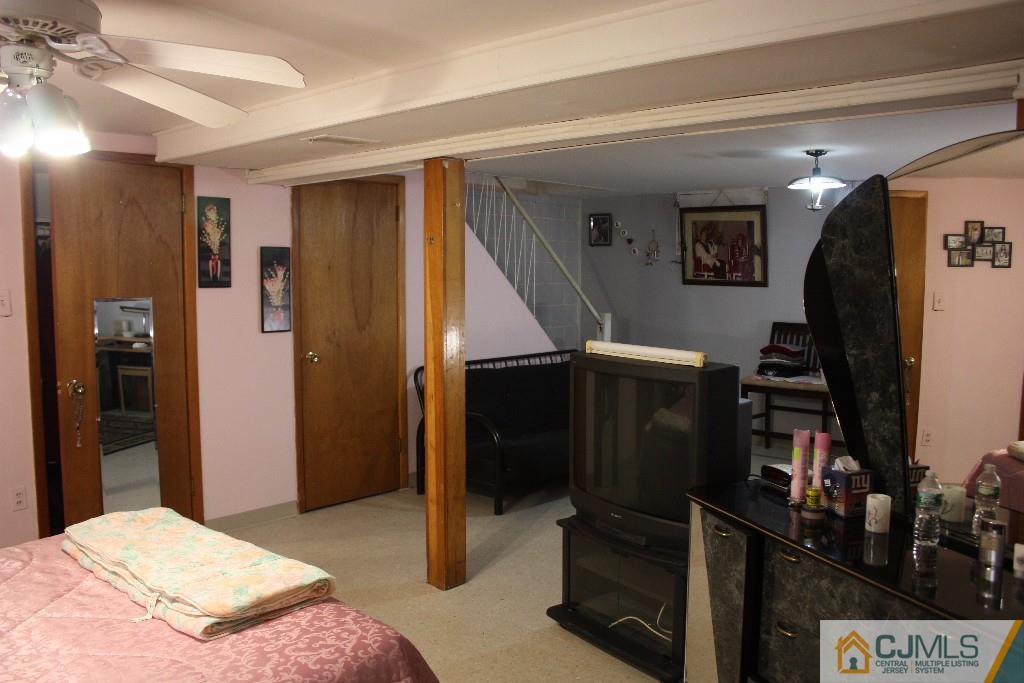 11 Bucknell Road Old Bridge, NJ 08859 - Photo 14 of 16 a bedroom with a bed and a walk in closet