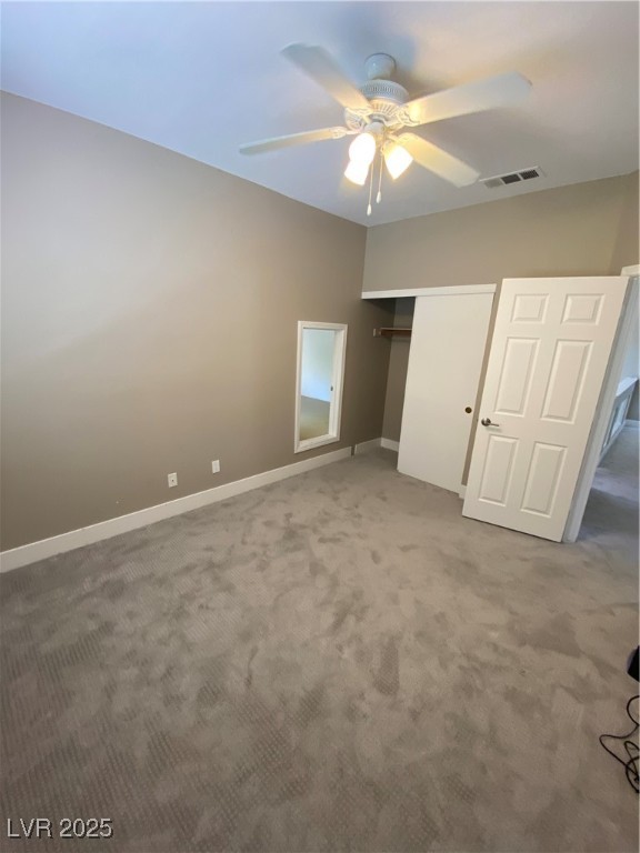 2225 Warm Walnut Drive Las Vegas, NV 89134 - Photo 17 of 38 Unfurnished bedroom with carpet, a closet, and a ceiling fan