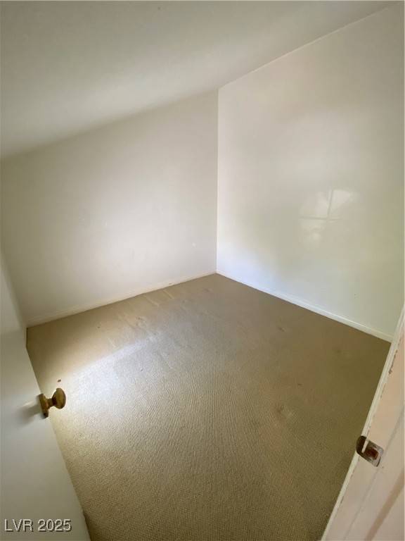 2225 Warm Walnut Drive Las Vegas, NV 89134 - Photo 19 of 38 Carpeted spare room featuring baseboards