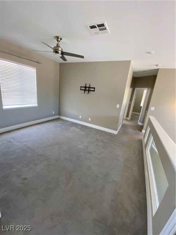 2225 Warm Walnut Drive Las Vegas, NV 89134 - Photo 26 of 38 Empty room with a ceiling fan and carpet flooring