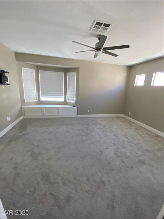 2225 Warm Walnut Drive Las Vegas, NV 89134 - Photo 27 of 38 Carpeted empty room with baseboards and a ceiling fan