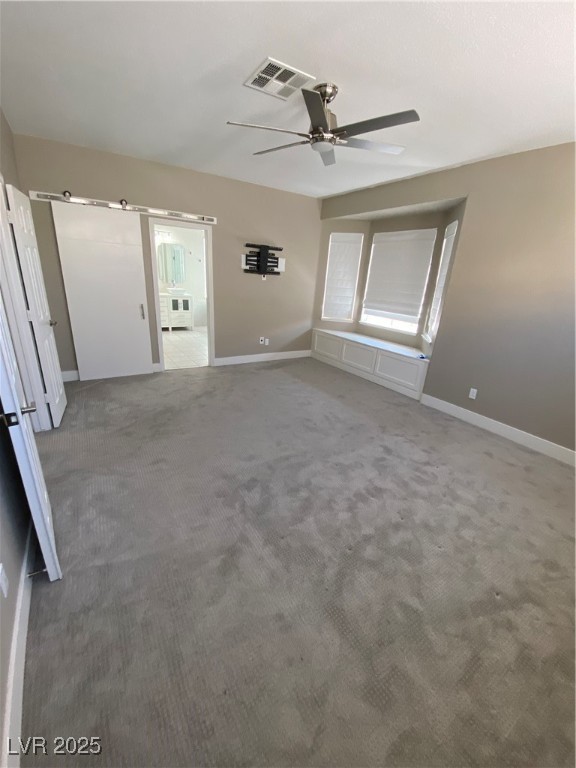 2225 Warm Walnut Drive Las Vegas, NV 89134 - Photo 28 of 38 Carpeted empty room with a ceiling fan and baseboards