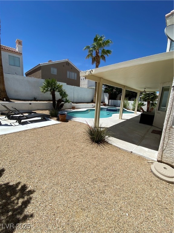 2225 Warm Walnut Drive Las Vegas, NV 89134 - Photo 38 of 38 Swimming pool featuring a patio area and a fenced backyard
