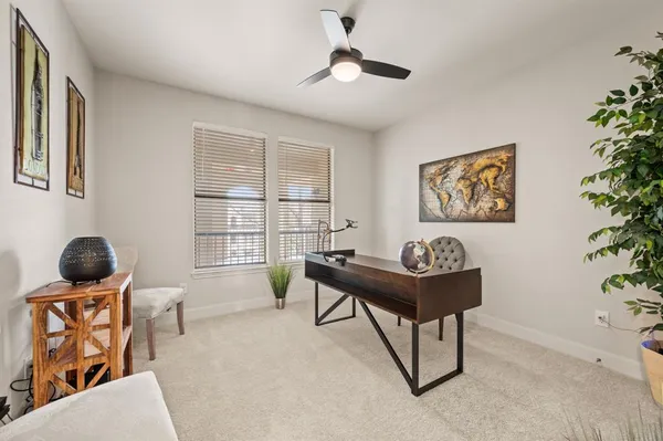 a living room with furniture and window