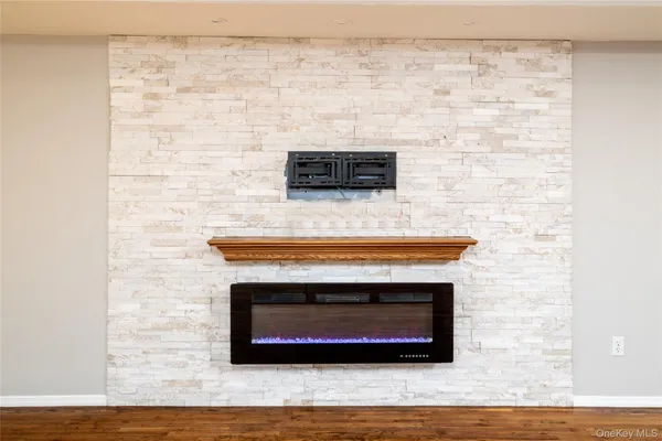 a living room with a fireplace