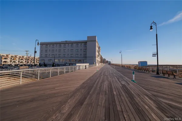 a view of a balcony with wooden floor