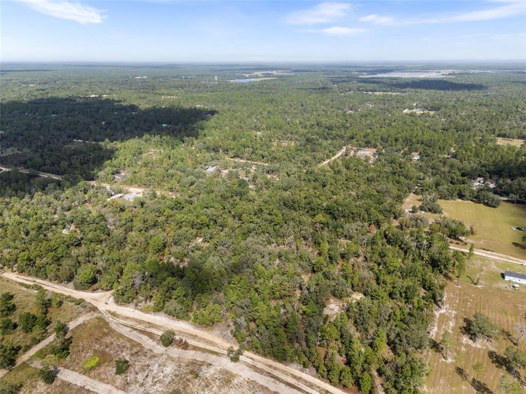 0 Northeast 75th Street Bronson, FL 32621 - Photo 6 of 11 a view of an outdoor space and a lake view