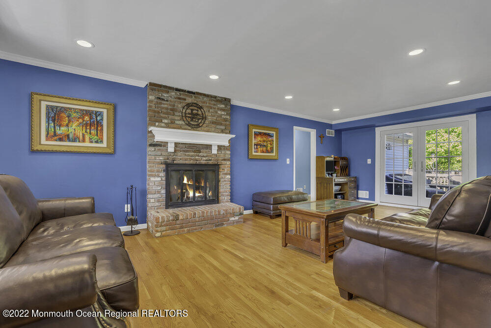 960 Farmingdale Road Jackson, NJ 08527 - Photo 14 of 39 a bedroom with furniture and a large window
