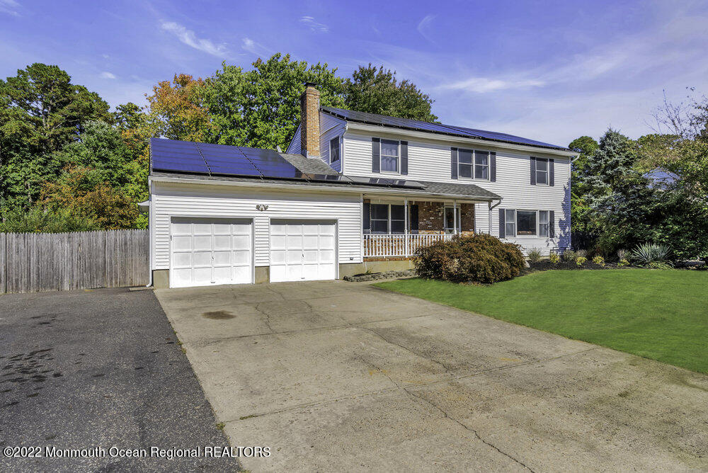 960 Farmingdale Road Jackson, NJ 08527 - Photo 2 of 39 front view of a house with a garden