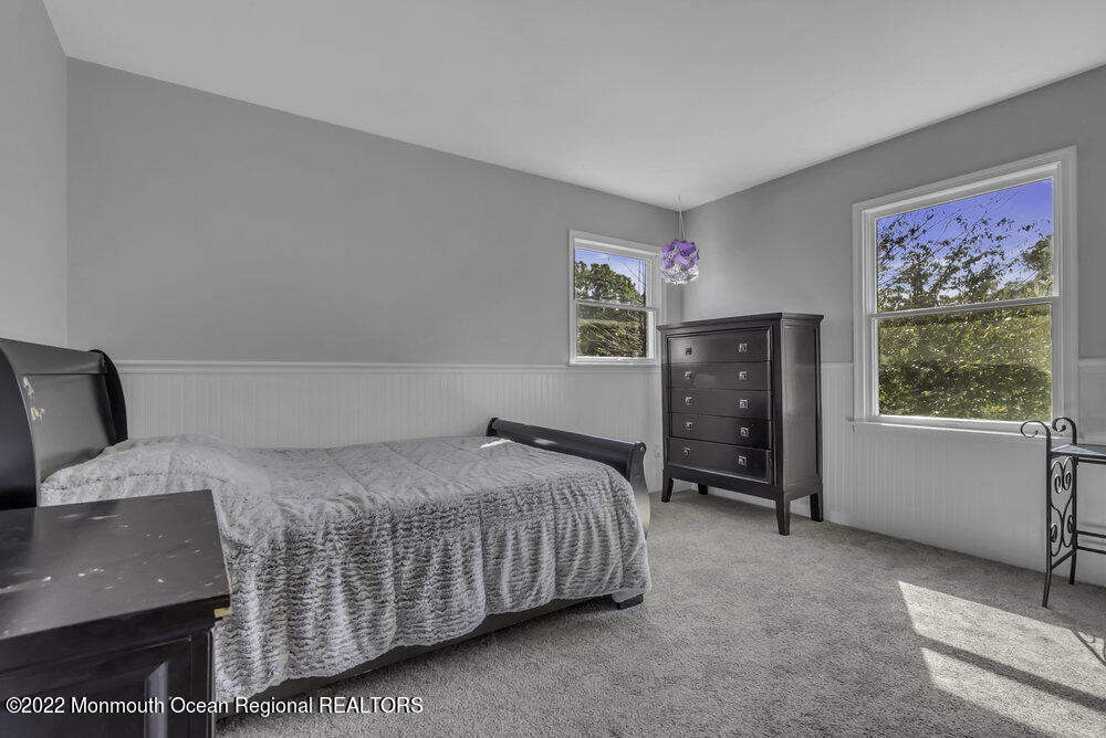 960 Farmingdale Road Jackson, NJ 08527 - Photo 21 of 39 a bedroom with a bed and a window