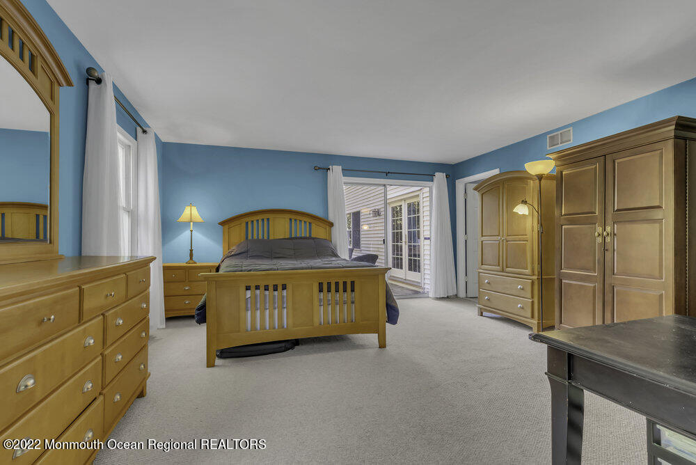 960 Farmingdale Road Jackson, NJ 08527 - Photo 26 of 39 a view of a bedroom with furniture and window