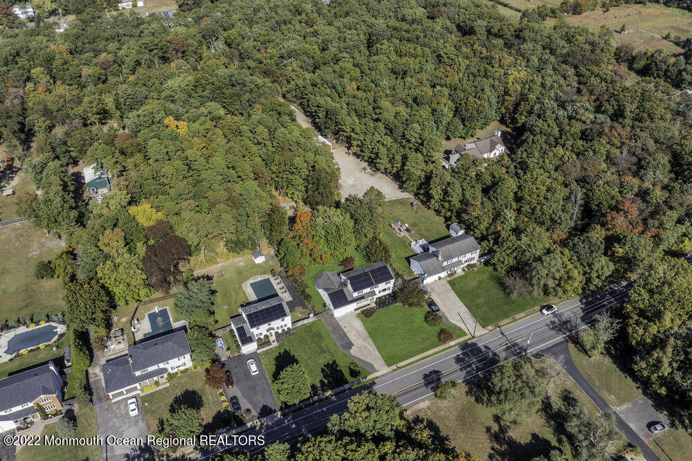 960 Farmingdale Road Jackson, NJ 08527 - Photo 34 of 39 an aerial view of a house with a yard