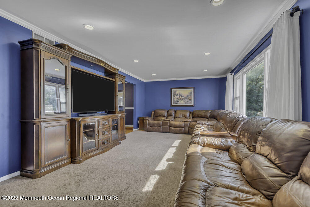 960 Farmingdale Road Jackson, NJ 08527 - Photo 6 of 39 a living room with furniture and a flat screen tv