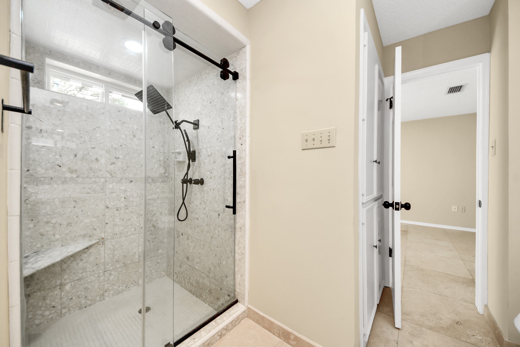 5 Tiffany Square Sugar Land, TX 77478 - Photo 16 of 32 a bathroom with a glass shower door