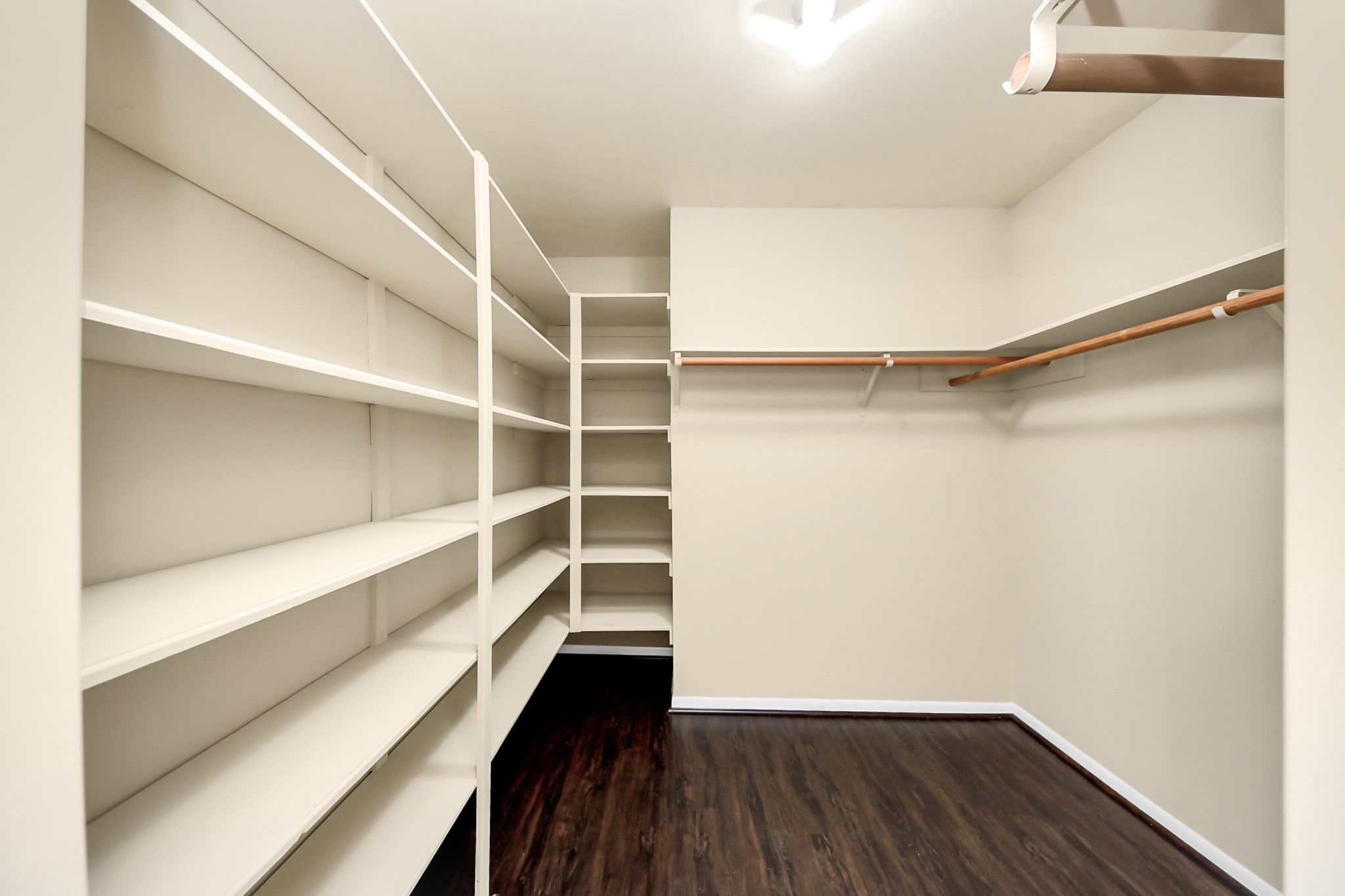5 Tiffany Square Sugar Land, TX 77478 - Photo 21 of 32 a view of walk in closet with empty racks