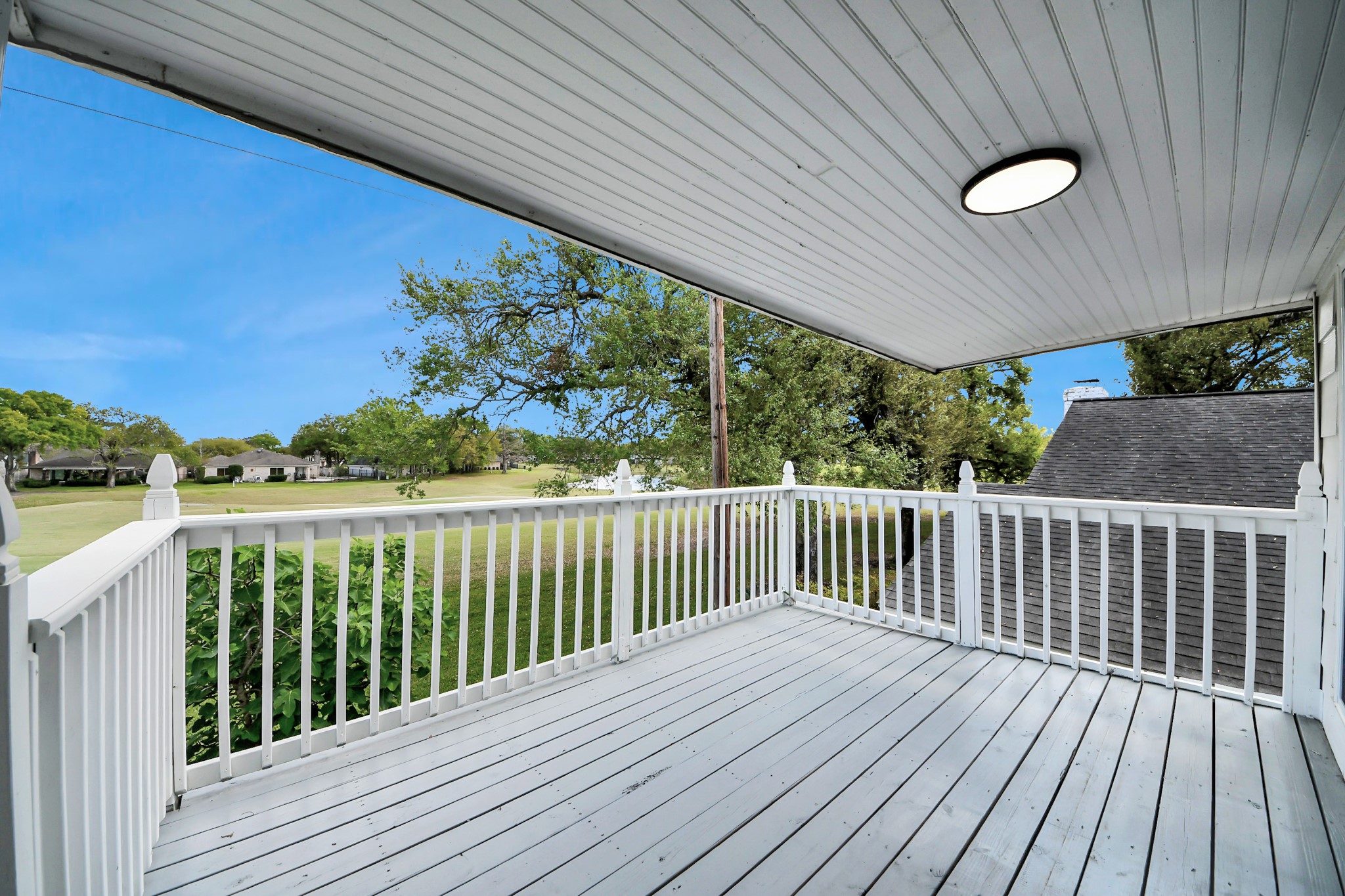 5 Tiffany Square Sugar Land, TX 77478 - Photo 26 of 32 a view of balcony with wooden floor & fence