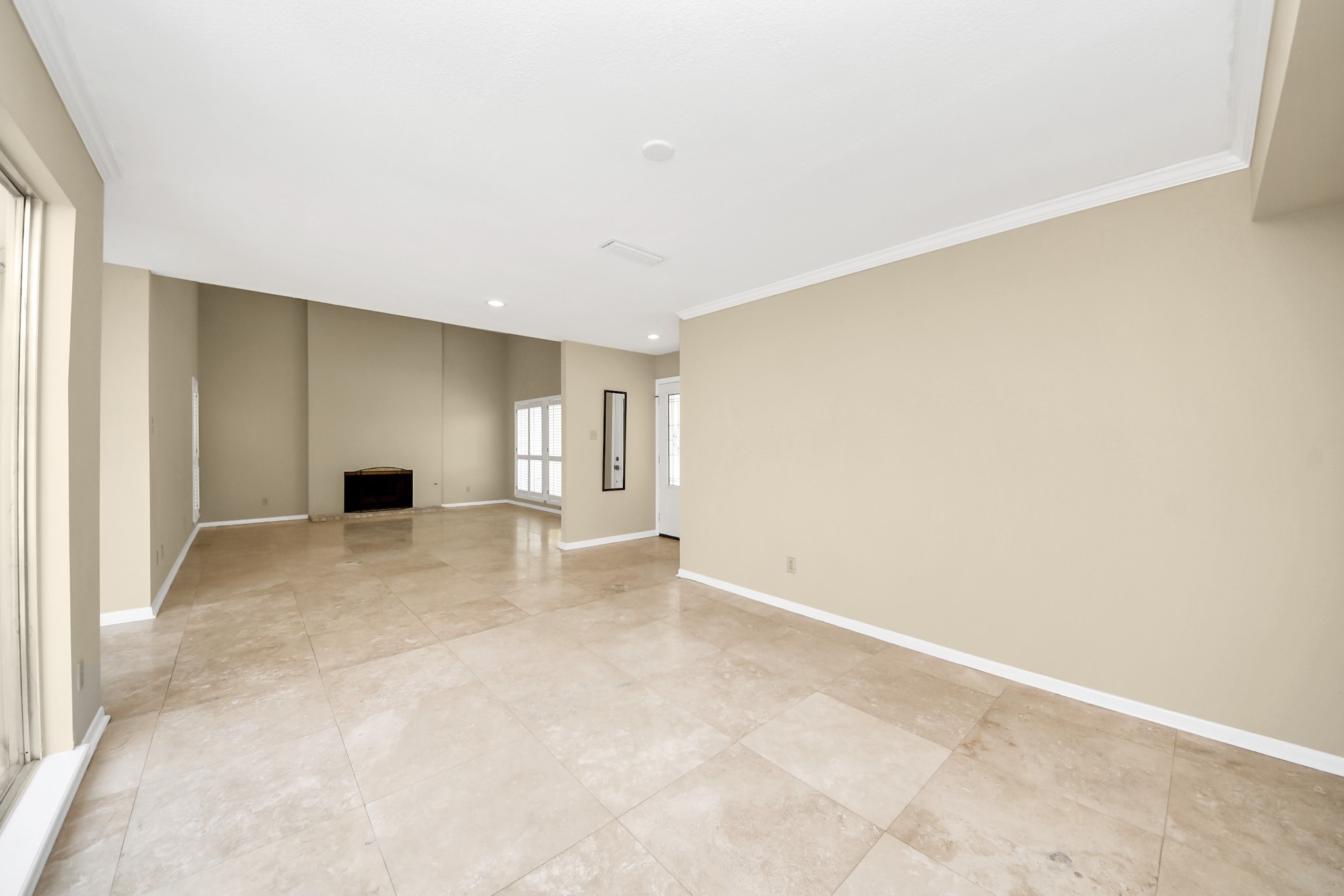 5 Tiffany Square Sugar Land, TX 77478 - Photo 7 of 32 a view of empty room with a fireplace