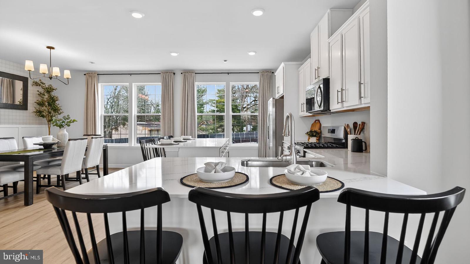5 Clementon Road East Gibbsboro, NJ 08026 - Photo 15 of 40 a view of a dining room with furniture window and outside view