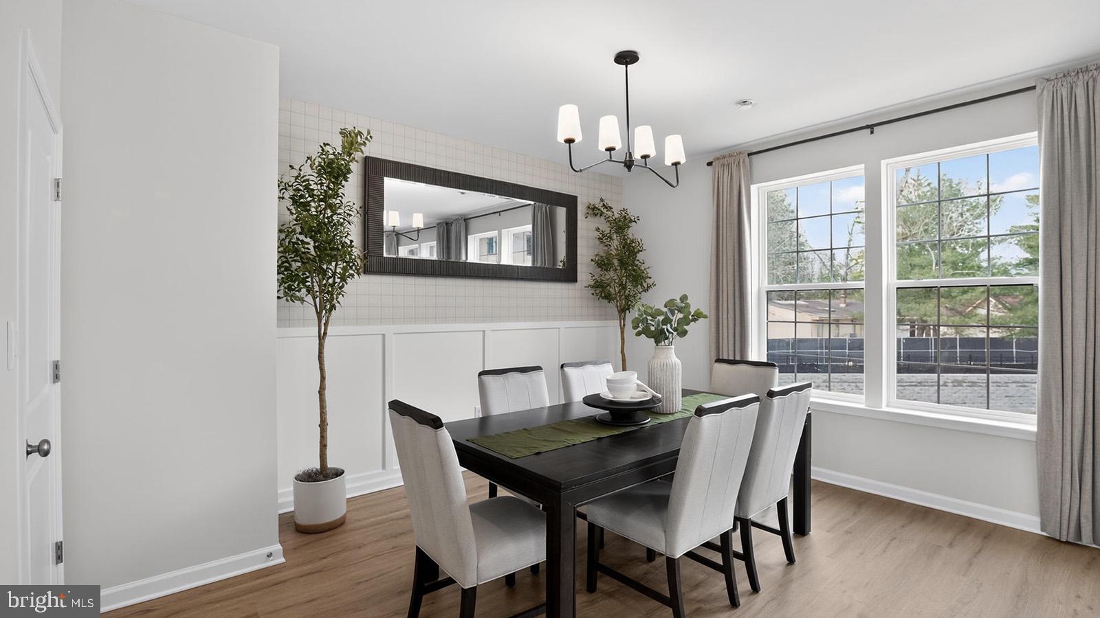 5 Clementon Road East Gibbsboro, NJ 08026 - Photo 17 of 40 a view of a dining room with furniture window and wooden floor