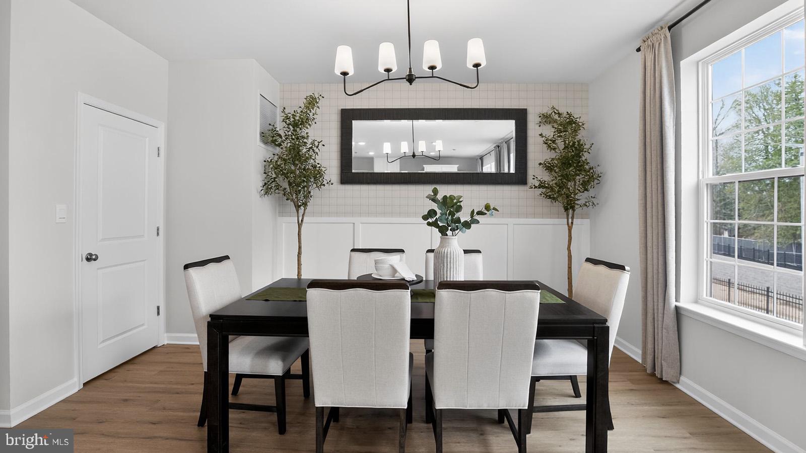 5 Clementon Road East Gibbsboro, NJ 08026 - Photo 18 of 40 a view of a dining room with furniture window and wooden floor