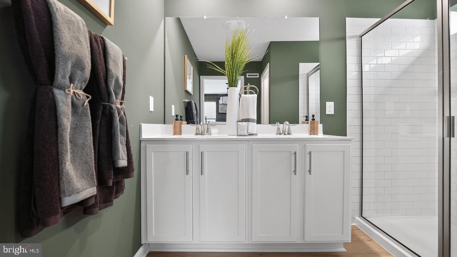 5 Clementon Road East Gibbsboro, NJ 08026 - Photo 30 of 40 a bathroom with a double vanity sink and a mirror