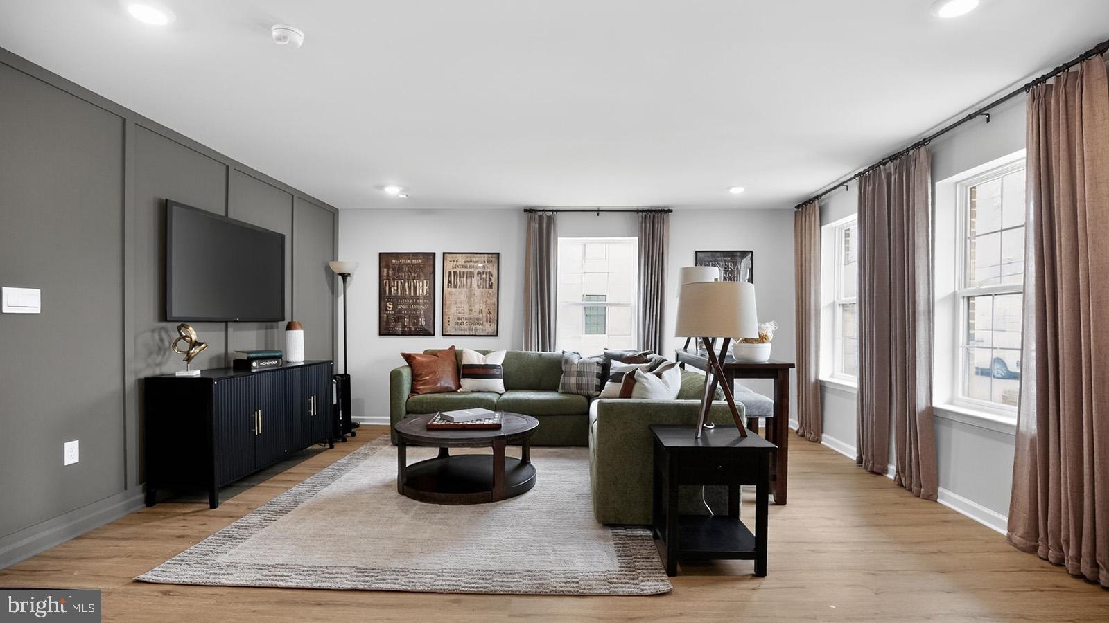 5 Clementon Road East Gibbsboro, NJ 08026 - Photo 34 of 40 a living room with furniture and a flat screen tv