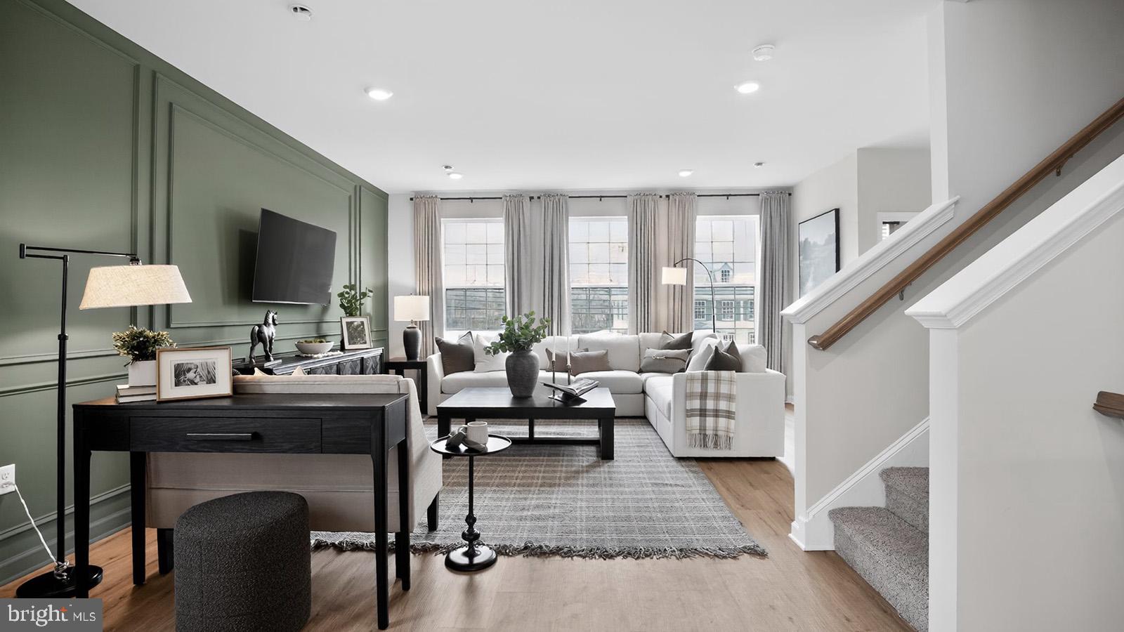 5 Clementon Road East Gibbsboro, NJ 08026 - Photo 36 of 40 a living room with furniture and a flat screen tv