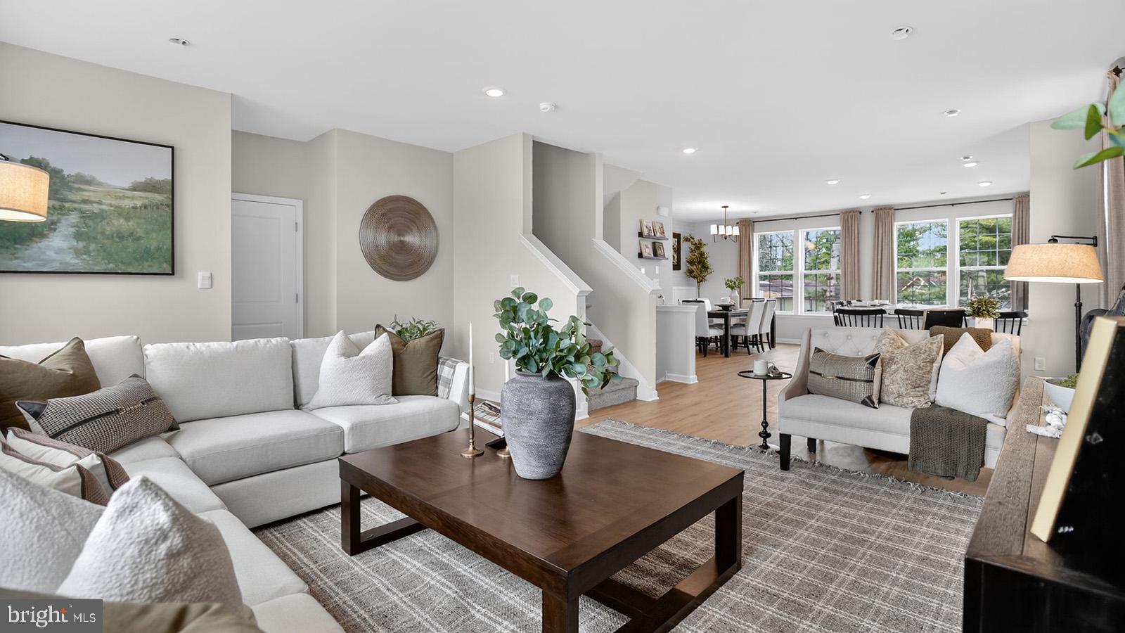 5 Clementon Road East Gibbsboro, NJ 08026 - Photo 8 of 40 a living room with furniture kitchen view and a large window