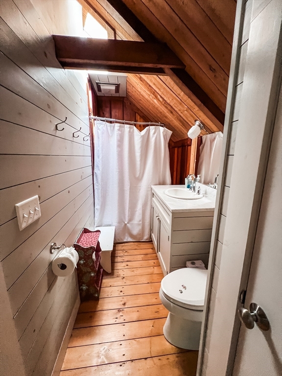 225 Lamberts Cove Road West Tisbury, MA 02568 - Photo 24 of 33 a bathroom with a sink and toilet
