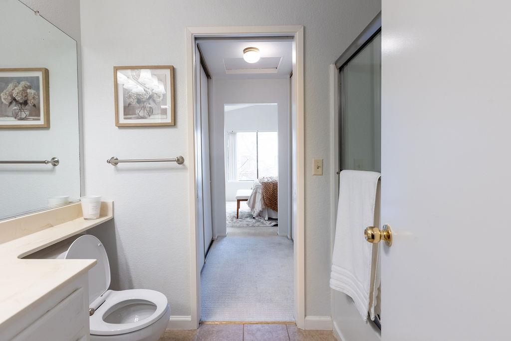 34565 Pueblo Terrace Fremont, CA 94555 - Photo 16 of 18 a bathroom with a toilet and a shower