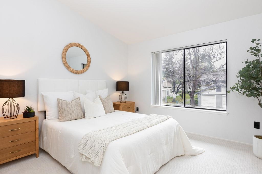 34565 Pueblo Terrace Fremont, CA 94555 - Photo 10 of 18 a bedroom with a large bed and a window