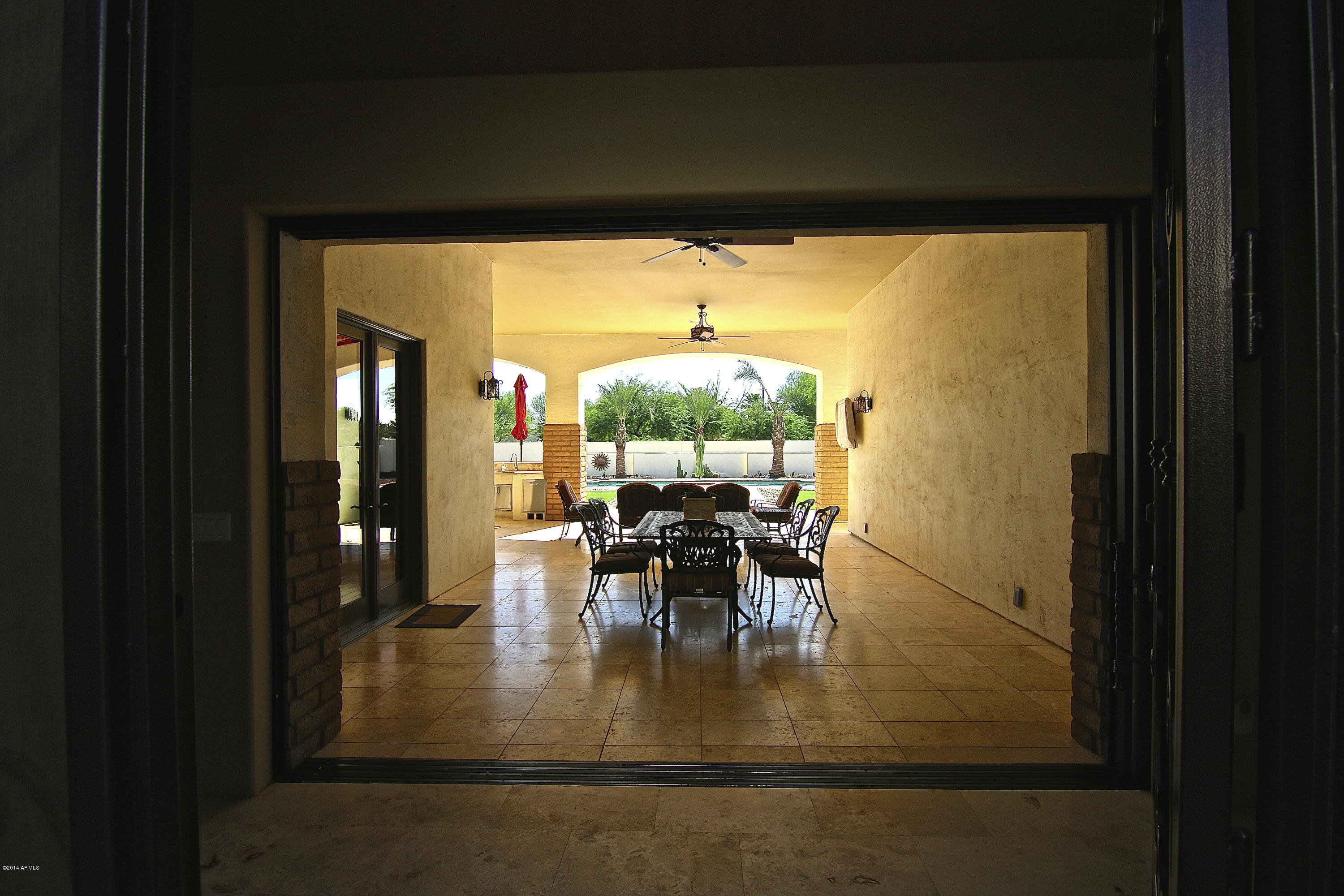 1950 East Appleby Road Gilbert, AZ 85298 - Photo 12 of 80 Glass door opening to covered patio