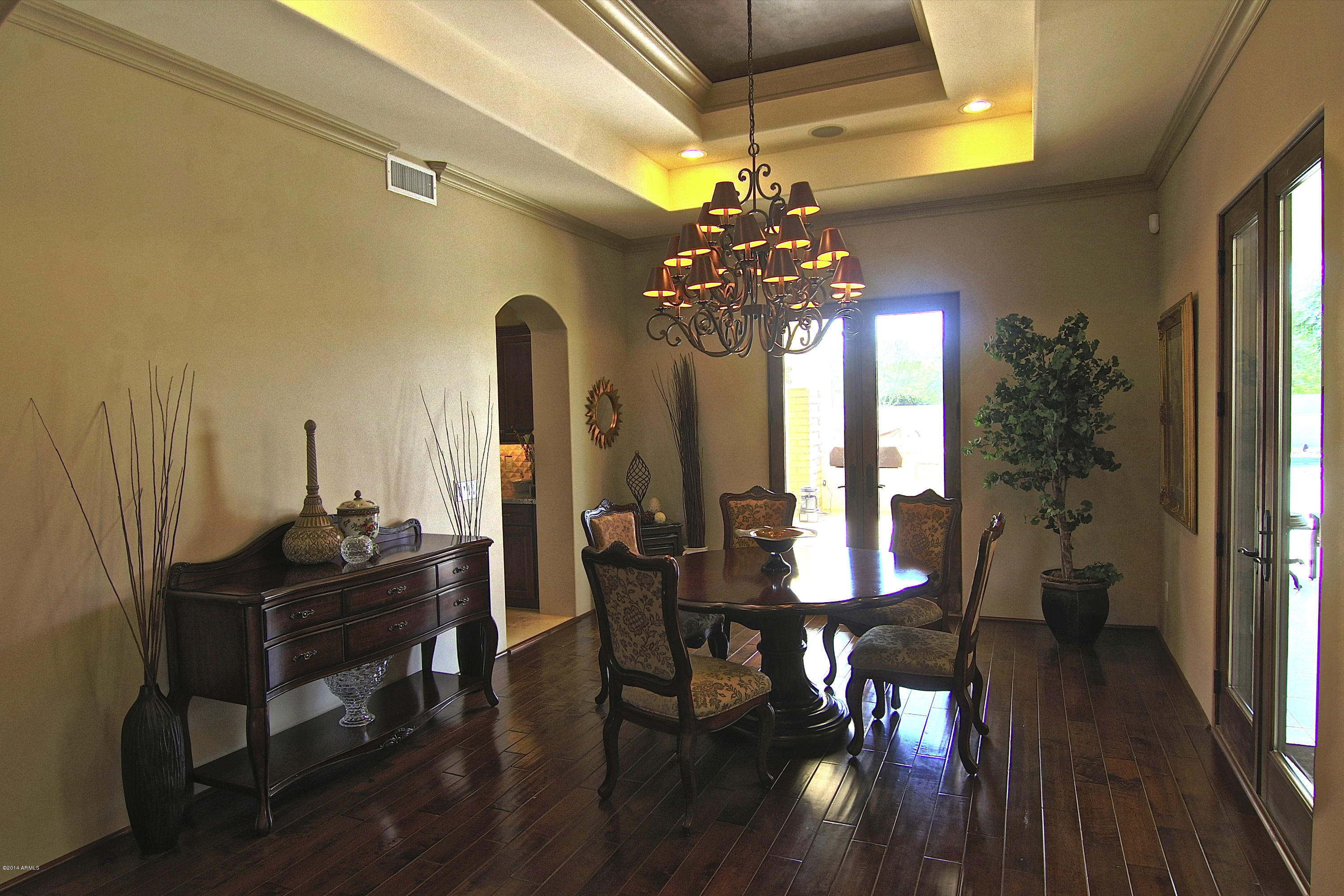 1950 East Appleby Road Gilbert, AZ 85298 - Photo 14 of 80 Formal dining w/ doors to patios