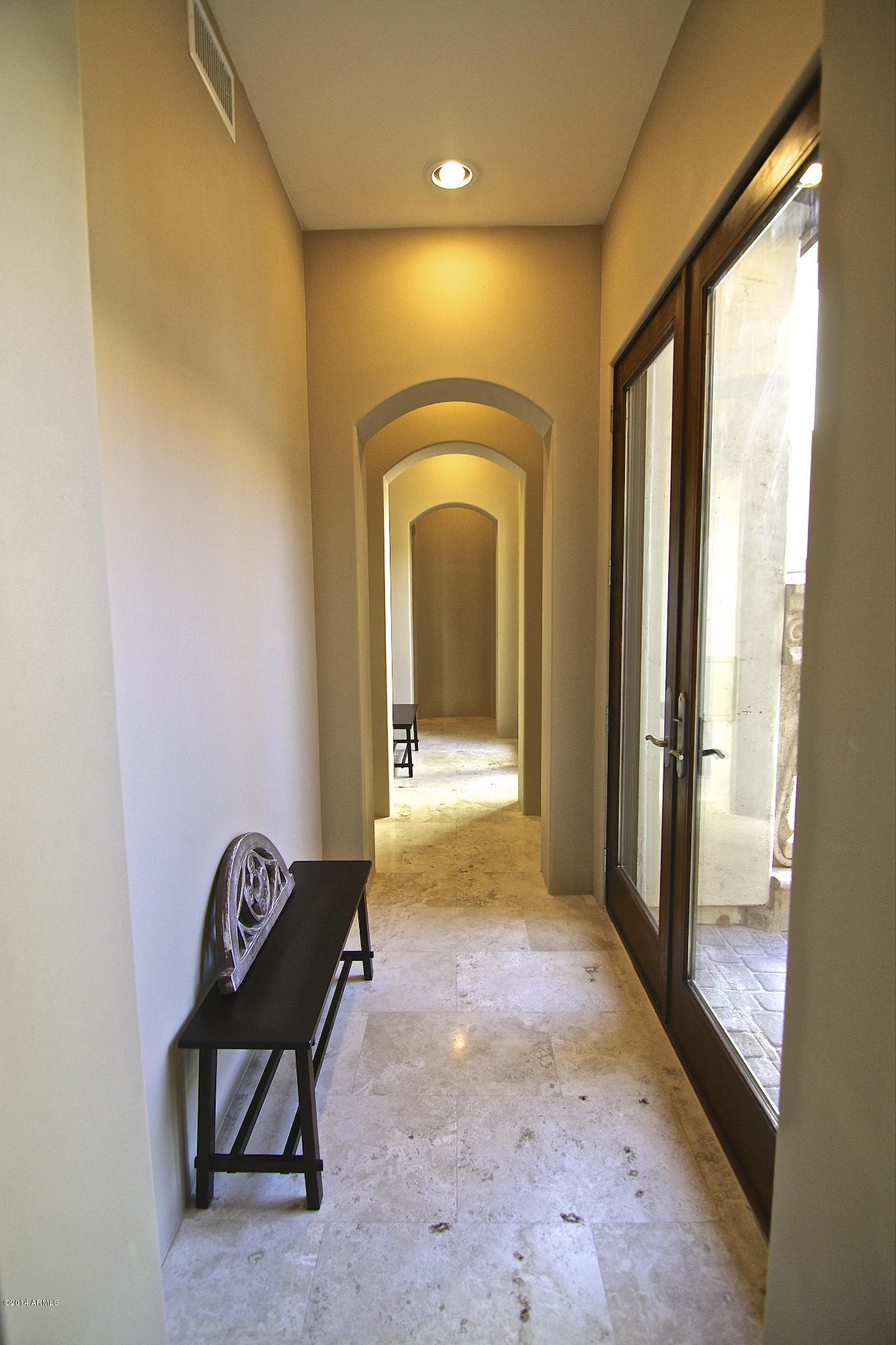 1950 East Appleby Road Gilbert, AZ 85298 - Photo 49 of 80 Hallway @ bedrooms - doors to courtyard
