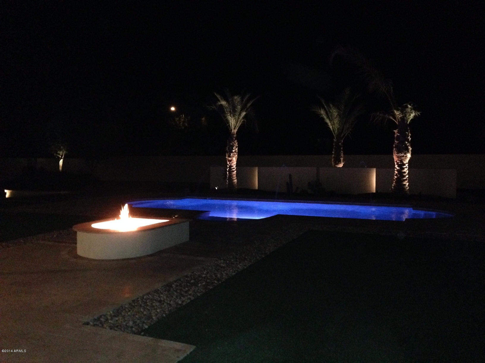 1950 East Appleby Road Gilbert, AZ 85298 - Photo 68 of 80 Salt water pool and glass fire feature