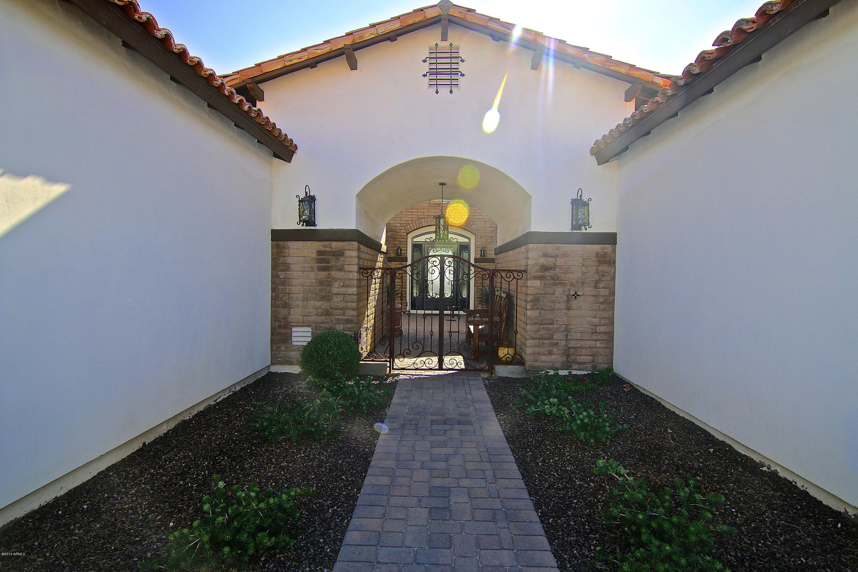 1950 East Appleby Road Gilbert, AZ 85298 - Photo 9 of 80 Pavers at walkway to gated courtyard