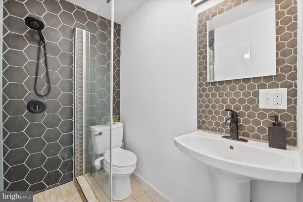 a bathroom with a sink and a toilet