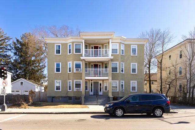 a car parked in front of a building