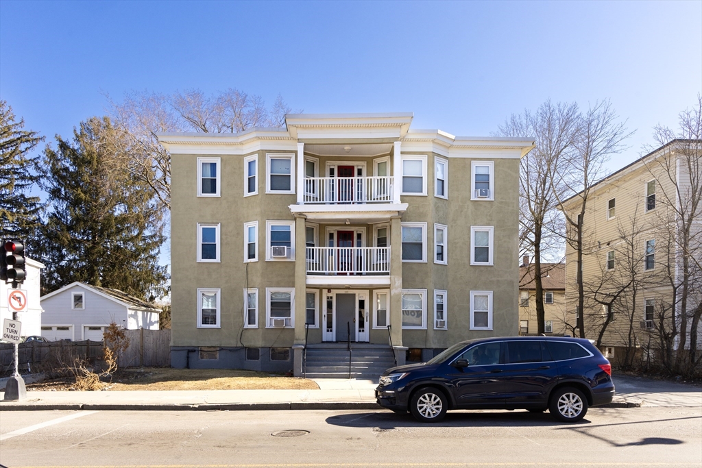 a car parked in front of a building