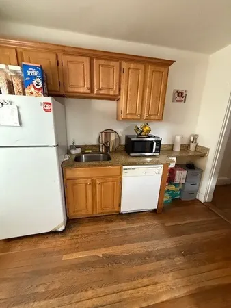 a utility room with washer and dryer