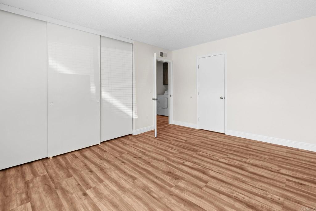 965 Jamacha Road El Cajon, CA 92019 - Photo 12 of 28 a view of an empty room with wooden floor