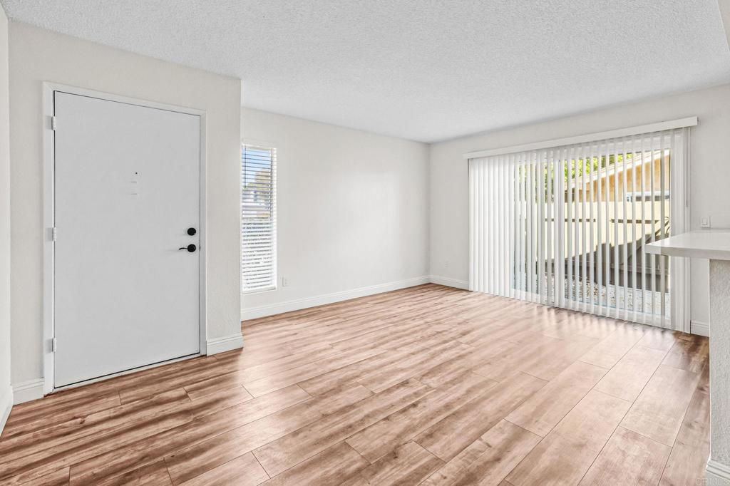965 Jamacha Road El Cajon, CA 92019 - Photo 4 of 28 a view of a livingroom with wooden floor