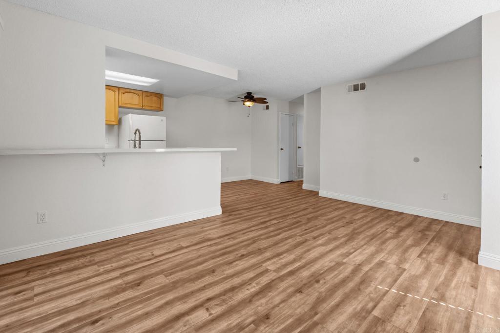 965 Jamacha Road El Cajon, CA 92019 - Photo 9 of 28 a view of a room with wooden floor and window