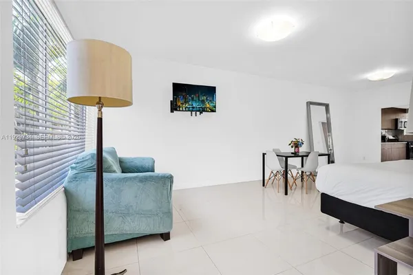 a living room with furniture and a table
