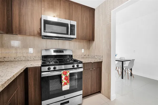 a view of a livingroom with furniture and window