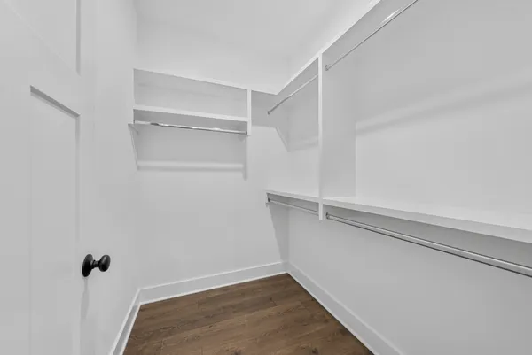 a view of an empty walk in closet